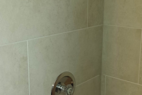 Photo of large grey tile in shower