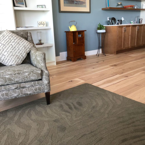 Photo of a living space with a fancy area rug