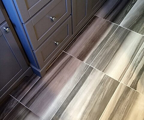 Bathroom floor with grey tile