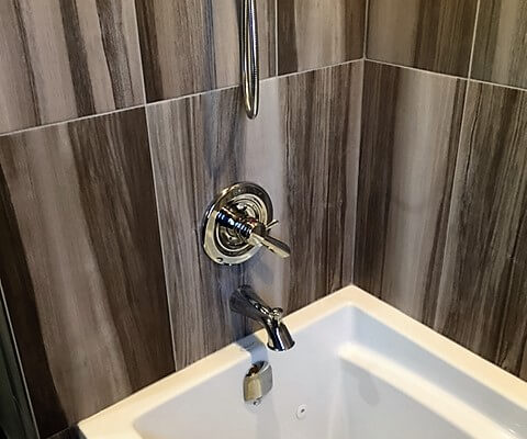 Close up of tiled tub/shower