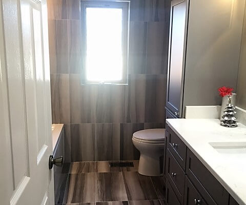 A fully tiled bathroom